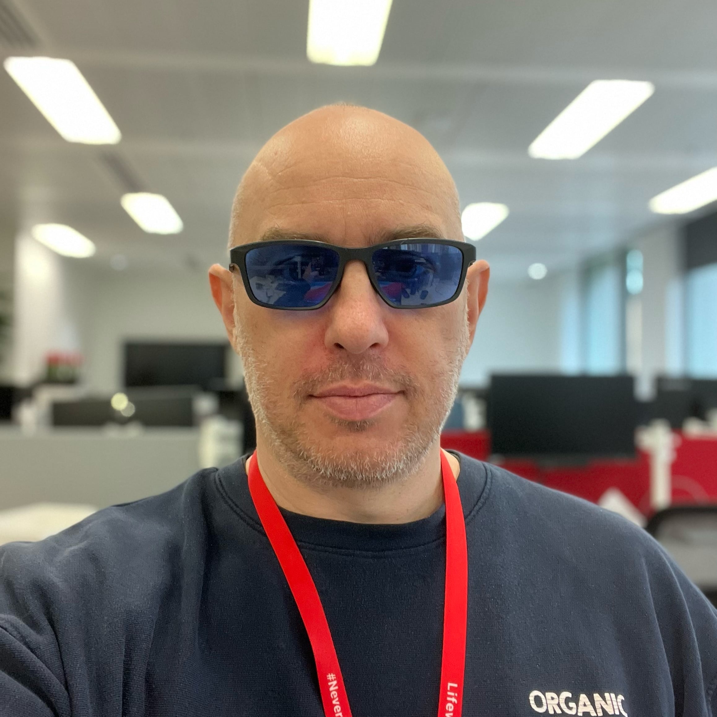 Jonathan wearing blue glasses